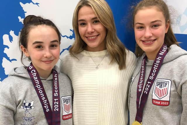 Maia Thomson, left, and Katy Cameron, right, with Sportif Judo Scottish team member Hannah Wood in Largs