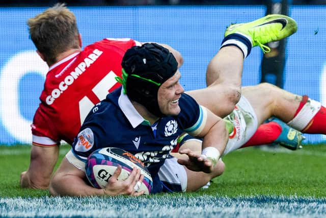 Darcy Graham scoring Scotland’s third try of their 35-29 win against Wales in rugby’s Six Nations at Edinburgh’s Murrayfield Stadium on Saturday (Photo by Craig Williamson/SNS Group/SRU)