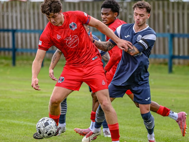 Harry Fowler in possession for Hawick Royal Albert, with Callum Mitchell challenging, during their 3-2 win away to Vale of Leithen on Saturday (Photo: Hilary Isaac)