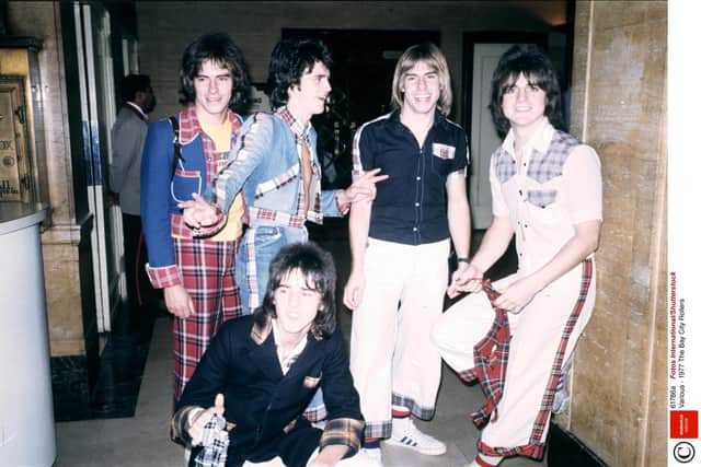 Edinburgh band, the Bay City Rollers circa 1977, Alan Longmuir, Les McKeown, Derek Longmuir, Eric Faulkner, Stuart Wood (kneeling)
Pic by: Fotos International/Shutterstock
