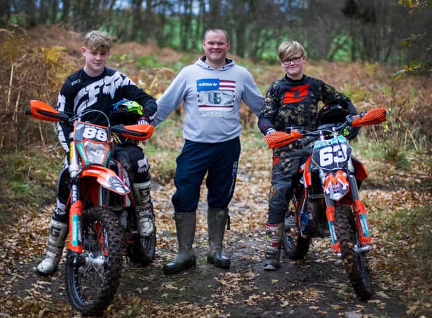 Nic Davidson with sons Callum, left, and Robbie