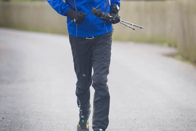 Ryan Small on his 24 running challenge at Galashiels for Poppyscotland. (Photo: BILL McBURNIE)