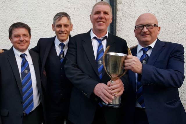 Dougie Hogg, far right, at a cup presentation