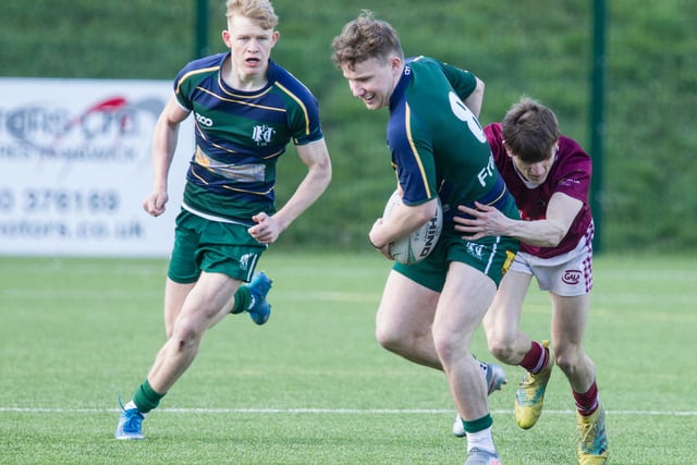 Finlay Douglas on the charge for Hawick Youth, supported by Owain Gray, against Gala at his club's semi-junior sevens