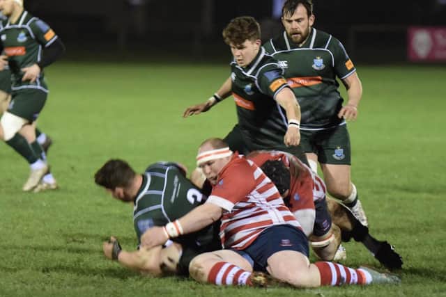 Matt Carryer tackling Ross Graham during Hawick's 38-7 Border League win away to Peebles at the Gytes on Friday (Photo: Malcolm Grant)