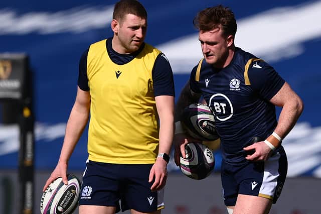 Stuart Hogg and Finn Russell chatting ahead of the Guinness Six Nations match between Scotland and Italy at Murrayfield on March 20, 2021, in Edinburgh (Photo by Stu Forster/Getty Images)