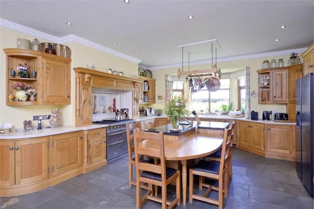 The property boasts a fantastic farmhouse-style kitchen.