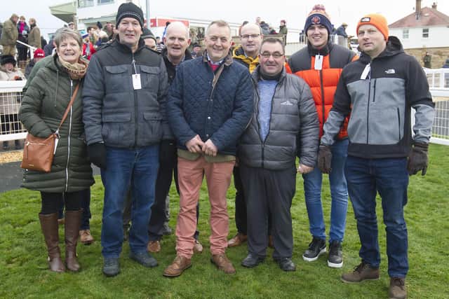 Selkirk racehorse trainer Stuart Coltherd, centre, with Grand Voyage's owners, the Shire Dreamers syndicate (Pic: Bill McBurnie)