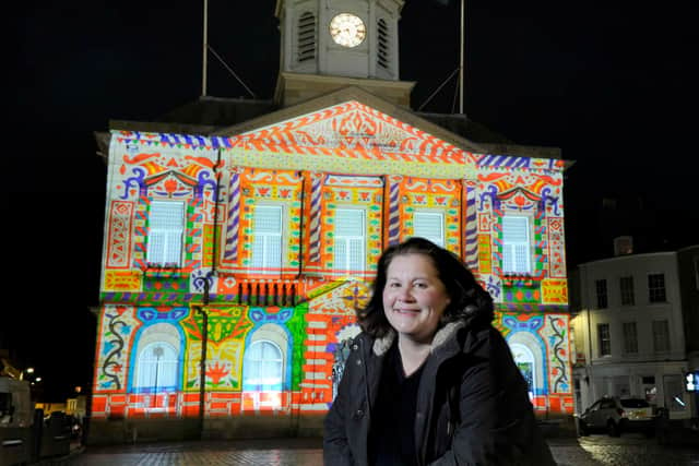 Pictured is Frances Fergusson, Border Art Fair director, with the winning senior category design by Christopher Blackwell, 17, from Jedburgh.
