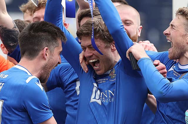 Murray Davidson of St Johnstone celebrating after his side defeated Hibernian 1-0 during the Scottish Cup final at Hampden Park on May 22 in Glasgow (Photo by Ian MacNicol/Getty Images)