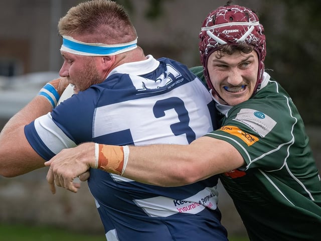 Jack Henry making a tackle for Hawick, on Euan McLaren, during their 80-13 loss away to Heriot’s in Edinburgh on Saturday (Photo: Jonathan Cruickshank)