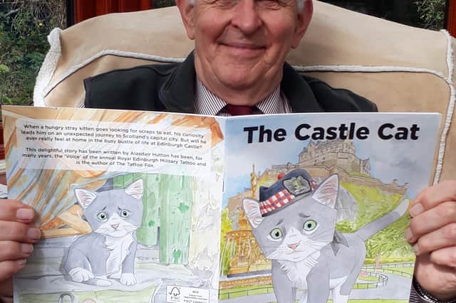 Alasdair Hutton with his book The Castle Cat.