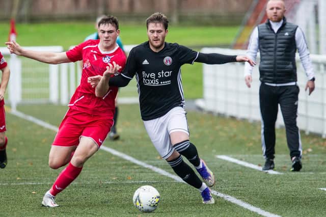 Civil Service Strollers' Lewis Duffy vying for possession with Gala Fairydean Rovers' Ross Aitchison as home boss Neil Hastings looks on (Photo: Bill McBurnie)