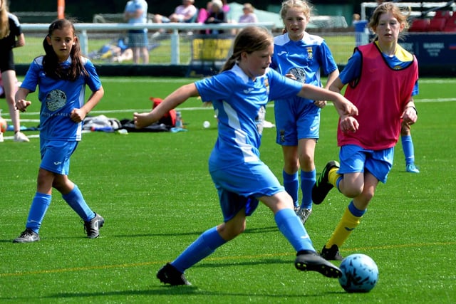 Girls from Lauder and Coldstream taking part in Sunday's children's football festival at Netherdale in Galashiels