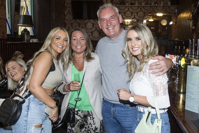 Amy Scott, Kendra and Malcolm Grant with Carly McAllan at the Queens head pub before the party at the Town Hall.