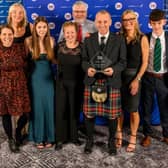 Representatives of Gala Harriers with Mark Pollard after being named as impact club of the year at 2025’s Scottish Athletics awards dinner, held in Glasgow on Saturday (Photo: Bobby Gavin)