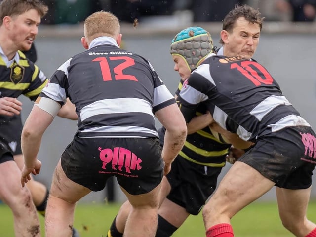 Gavin Wood in action for Melrose, with Dwain Patterson challenging, as they lost 39-22 away to Kelso at Poynder Park on Saturday (Photo: Andy McLean)