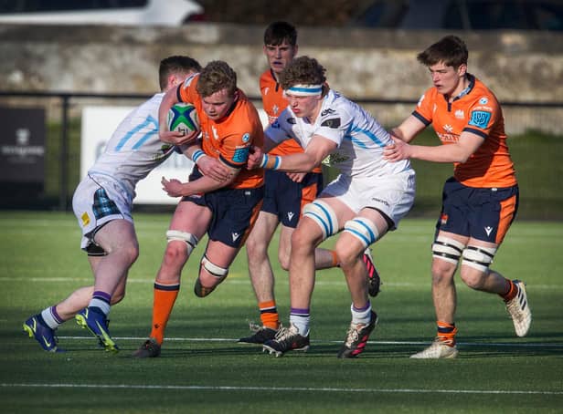 Munroe Job, from Selkirk, forces his way past Glasgow's defence to create an opening for Edinburgh (all pictures by Bill McBurnie)
