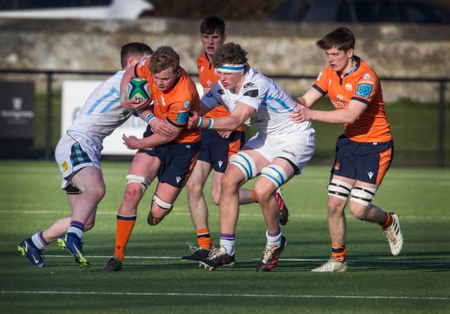 Munroe Job, from Selkirk, forces his way past Glasgow's defence to create an opening for Edinburgh (all pictures by Bill McBurnie)