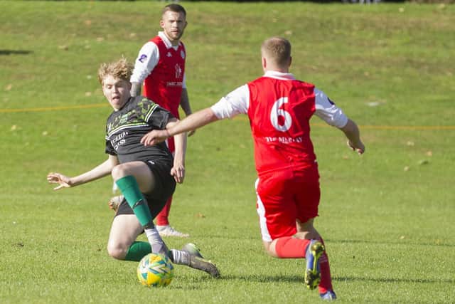 Hawick Legion's Ollie Stewart was yellow-carded for this tackle against Polbeth United on Saturday (Pic: Bill McBurnie)