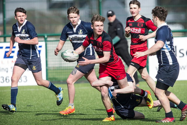 Ben Simmonds playing for Duns Colts at Hawick's semi-junior sevens tournament