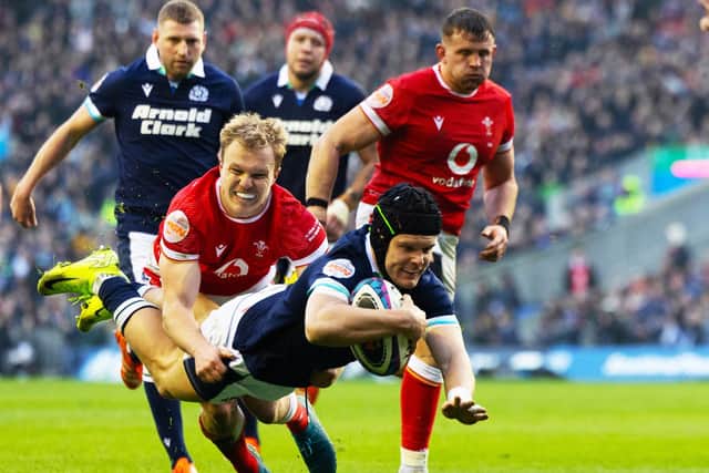 Darcy Graham scoring Scotland’s third try of their 35-29 win against Wales in rugby’s Six Nations at Edinburgh’s Murrayfield Stadium on Saturday (Photo by Ross MacDonald/SNS Group/SRU)