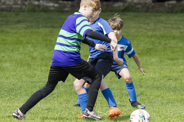 Hudson McLeod playing for Wilton Primary in his grandad John Slorance's football competition