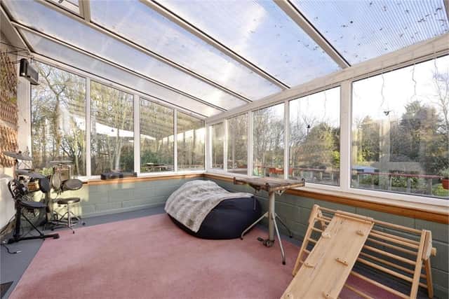 The conservatory has been designed to make the most of the outlooks over the garden beyond.