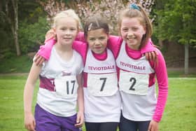 Freya Walker, Chloe Walker and Ruby Watson at Teviotdale Harriers' Hawick Burns Club races on Saturday