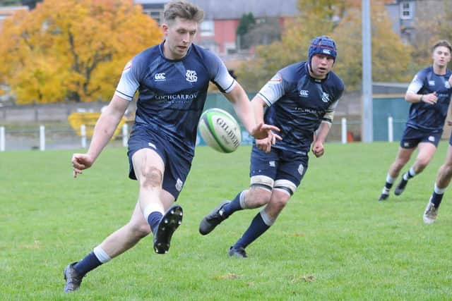 Josh Welsh kicking ahead for Selkirk during their 36-8 defeat at Hawick on Saturday (Photo: Grant Kinghorn)