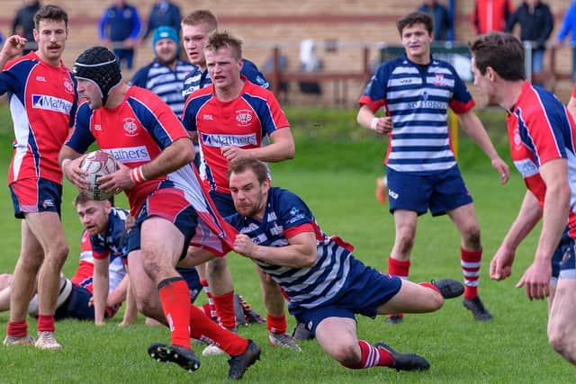 Peebles head coach Iain Chisholm putting a tackle in on Saturday against Newton Stewart (Pic: Stephen Mathison)