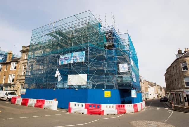 The historic building has been covered by scaffolding for several years. Photo: Bill McBurnie.