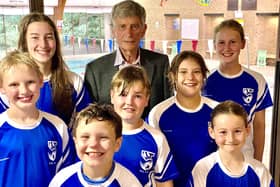 Martin Hunt, Trustee of the Hayward Sanderson Trust with swimmers. Back row, from left: Lucy D'Agrosa and Ava MacLeod. Middle row Russell Wilson, Corrie Little and Maizy Moody. Bottom row: Eoin Moody and Ruby McPhee.