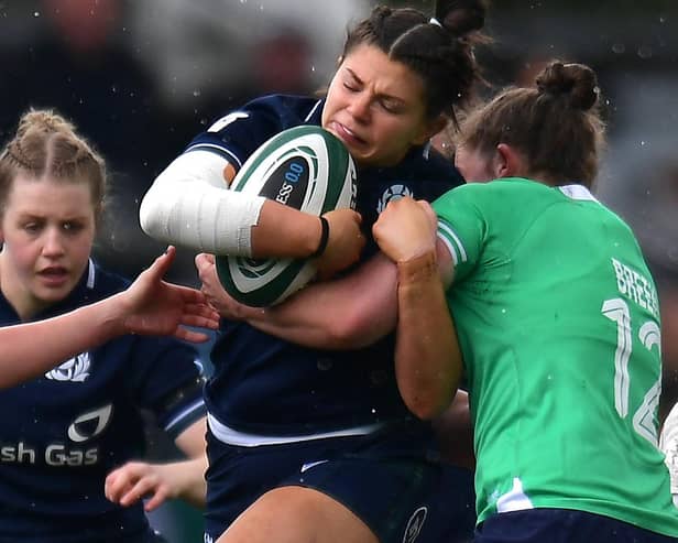 Scottish inside centre Lisa Thomson of Scotland being tackled by Ireland's Enya Breen during the visitors' 15-12 Women's Six Nations loss at Belfast's Kingspan Stadium on Saturday (Pic: Charles McQuillan/Getty Images)