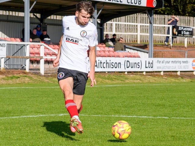 Kieran Burns in action for Duns Amateurs as they beat Hawick United 9-1 at home in round one of this football season’s Waddell Cup on Saturday (Photo: Alan Raeburn)