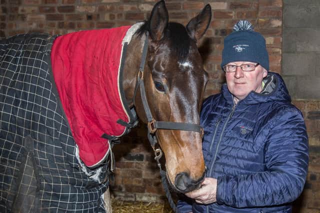 Hawick racehorse trainer Donald Whillans with another of his horses, Stolen Money (Photo: Bill McBurnie)