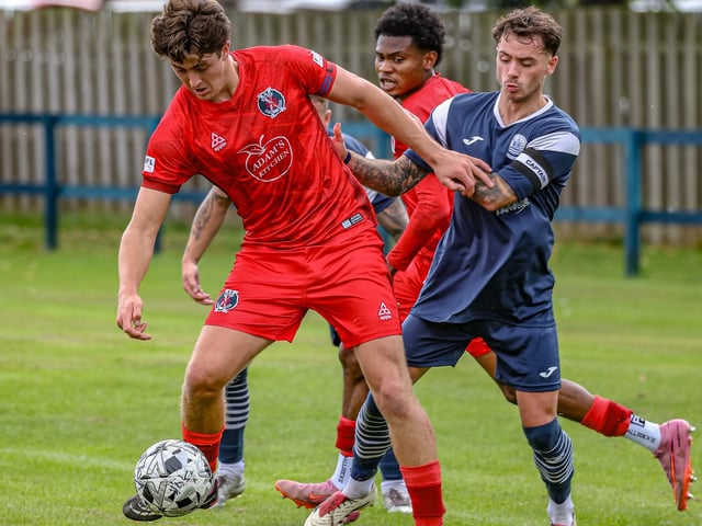 Harry Fowler on the ball for Hawick Royal Albert, with Callum Mitchell challenging, during their 3-2 win away to Vale of Leithen on Saturday (Photo: Hilary Isaac)