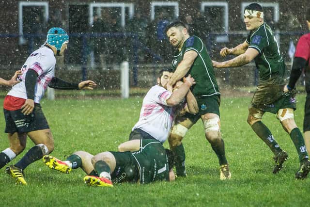 Hawick's Stuart Graham grappling with Selkirk's Bruce Riddell at Philiphaugh at the weekend (Photo: Bill McBurnie)