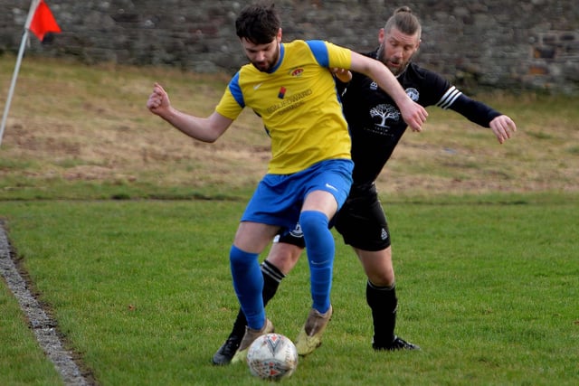 Ancrum's Kieran Fleming vying for the ball with Gala Hotspur's Douglas Hendry during the visitors' 2-1 win at Galashiels Public Park on Saturday (Pic: Alwyn Johnston)