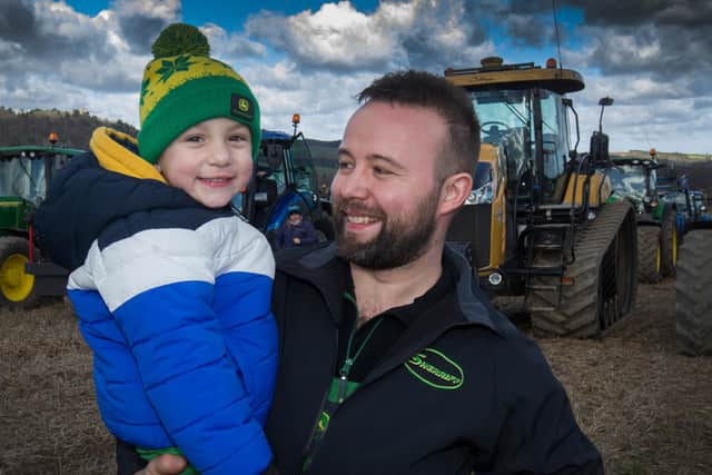 Dave Armfelt and son Oscar at Spittal on Rule after the tractor run raising funds for SiMBA