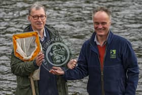 John Clayton, left, receives the 2022 Tweed Forum River Champion Award from Tweed Forum director, Luke Comins. Photo: Phil Wilkinson.
