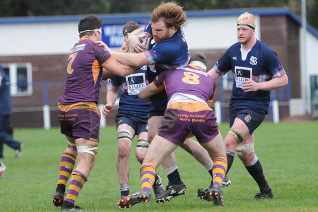 Selkirk's Joe Anderson being kept at bay by Marr at Philiphaugh on Saturday (Photo: Grant Kinghorn)