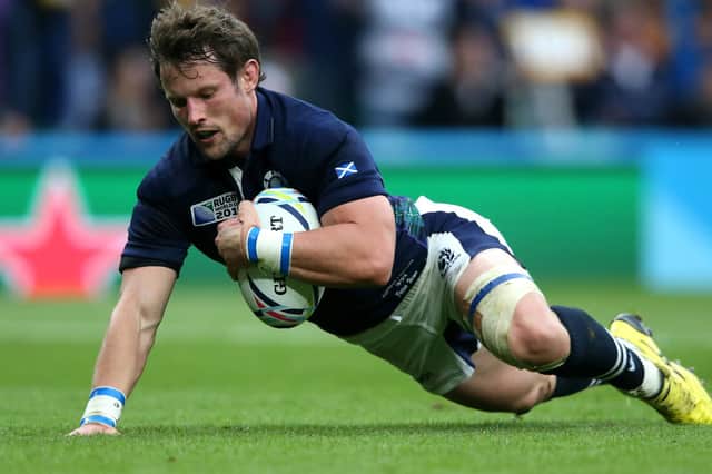 Peter Horne scoring for Scotland during their 2015 Rugby World Cup quarter-final match against Australia in London  (Photo by David Rogers/Getty Images)