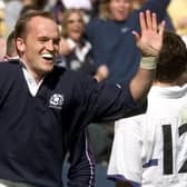 Scottish fly-half Gregor Townsend celebrating after scoring a try during the France-Scotland Five Nations rugby match on April 10, 1999, at the Stade de France in Saint-Denis (Photo: Gabriel Bouys/AFP via Getty Images)