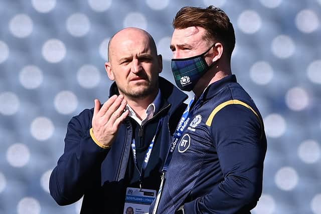 Gregor Townsend, head coach of Scotland, talks to Stuart Hogg on the pitch prior to  the Guinness Six Nations match between Scotland and Italy at Murrayfield on March 20, 2021, in Edinburgh (Photo by Stu Forster/Getty Images)