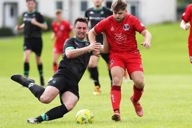 Hawick Legion's Cameron Rankine, right, being tackled during his side's 3-0 home loss to Greenlaw on Saturday (Pic: Brian Sutherland)