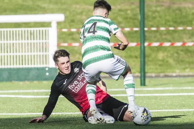 Gareth Rodger getting a tackle in for Gala Fairydean Rovers against Celtic B on Saturday (Photo: Bill McBurnie)
