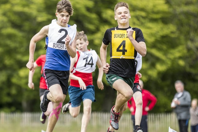 Hawick's Connor McLeod, right, competing in the youths' 400m handicap alongside TLJT's Aaron Glendinning, the race's winner