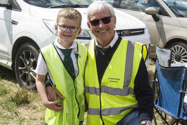 Parking attendant Rory Graham on duty at Mosspaul with help from his grandad Gordon Short.