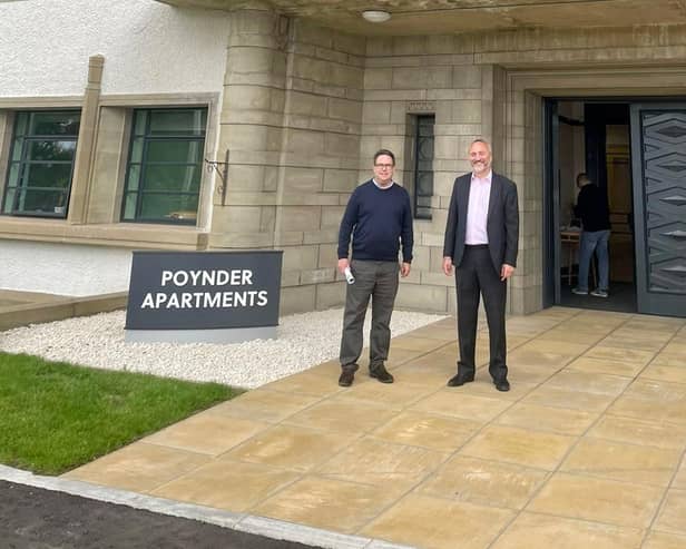 Craig Hoy MSP outside of Poynder Apartments in Kelso with Nile Istephan (Chief Executive of Eildon).